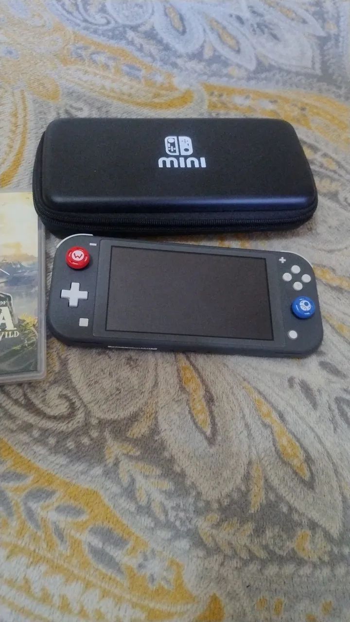Nintendo Switch Lite + Zelda BOTW - Foto 3