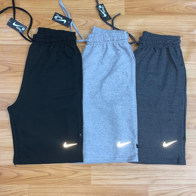 short nike refletivo