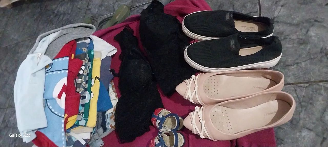 Clothes and an activity mat.. 64166868809730123