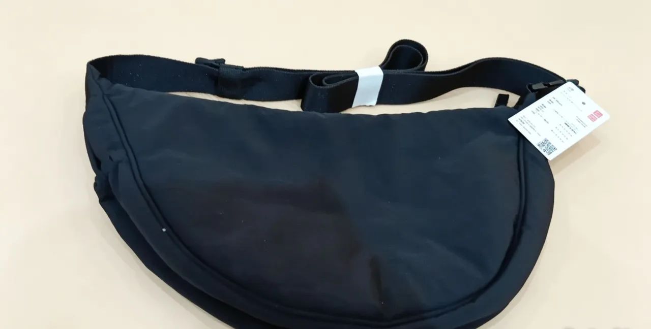 Bolsa original oniqlo preta comprada no Japão com nf  - Foto 4