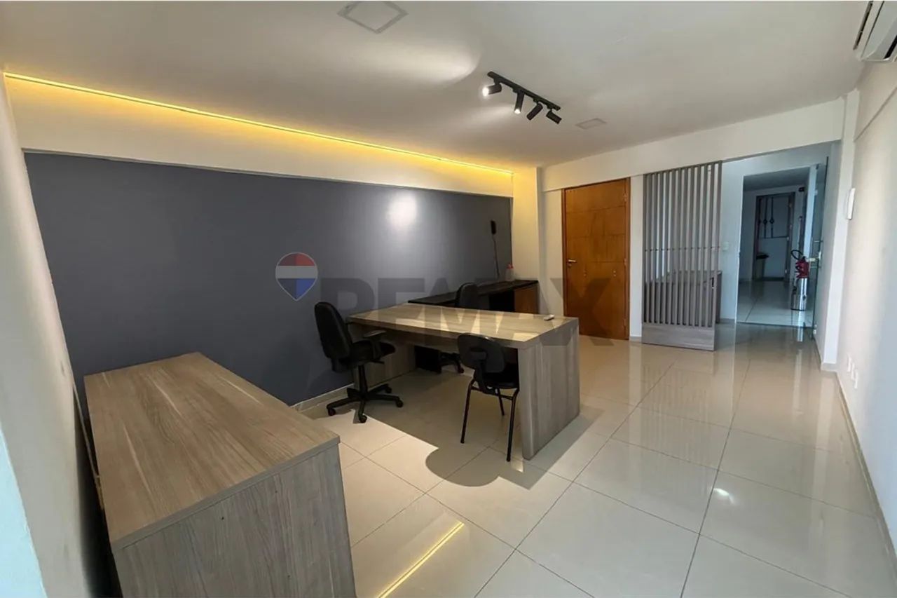 Sala comercial com mobilia