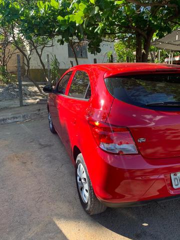 Vendo/troco/financio lindo onix 2014/ 1.0 completo - Foto 6