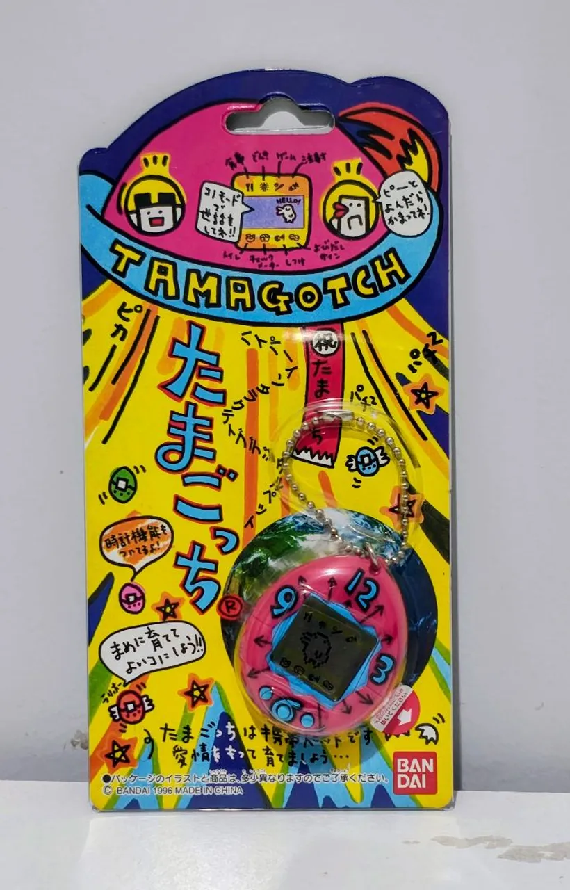 Tamagotchi Uni Purple (Roxo) - Completo na Caixa + Brinde