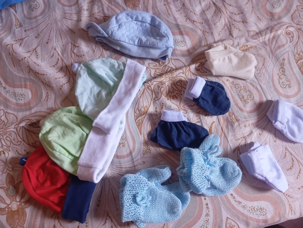 Roupas de bebê,retirada em oitizeiro 