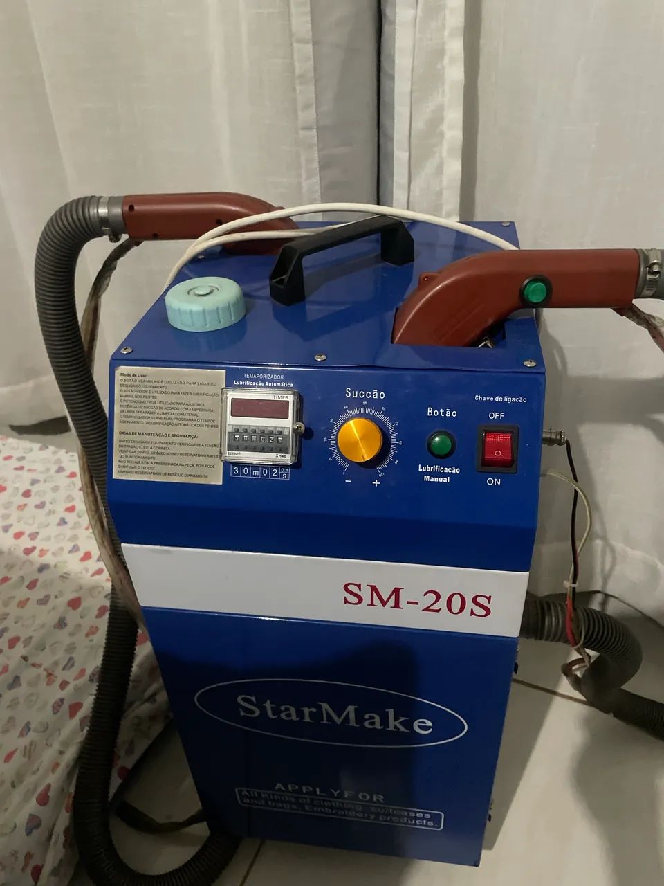 Máquina de tirar linha 