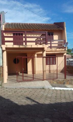 Alugo sobrado 2 dormitórios em condomínio fechado em Viamão - RS040