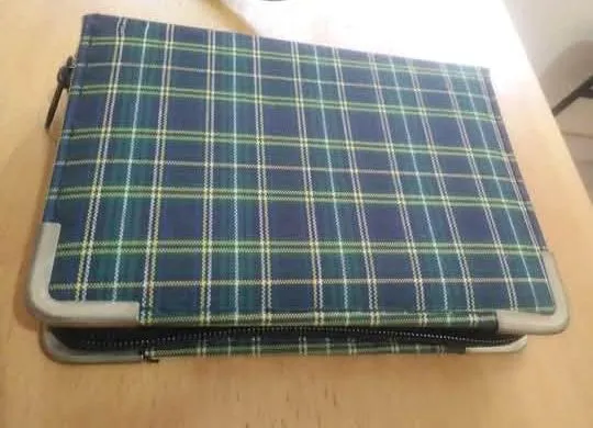 Pastinha com zíper para mini agenda e bloco de notas.