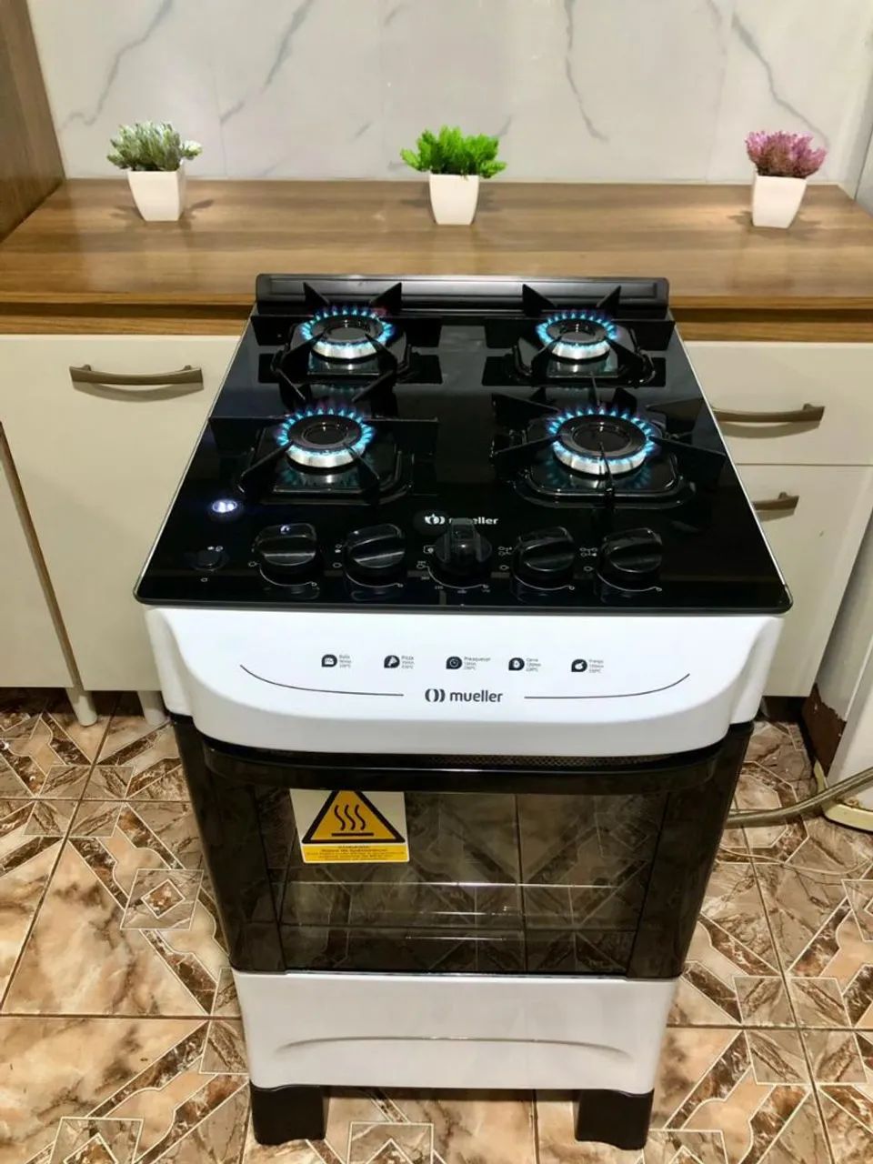 Vendo fogão modelo Mueller mesa de vidro de 04 BOCAS  - Foto 3