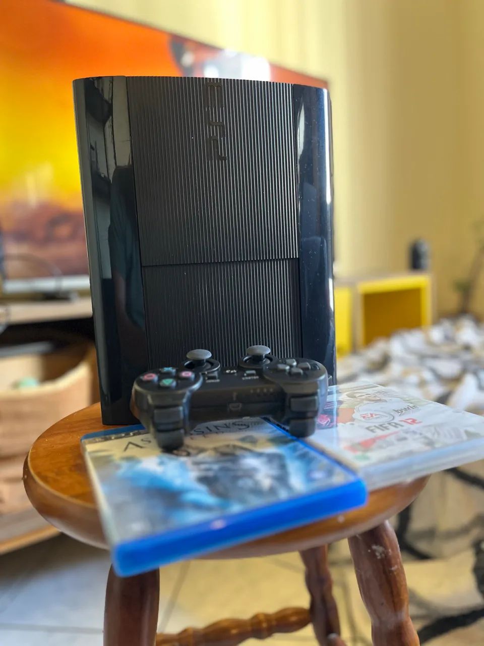 PlayStation 3 Slim + controle + 2 jogos - Foto 2