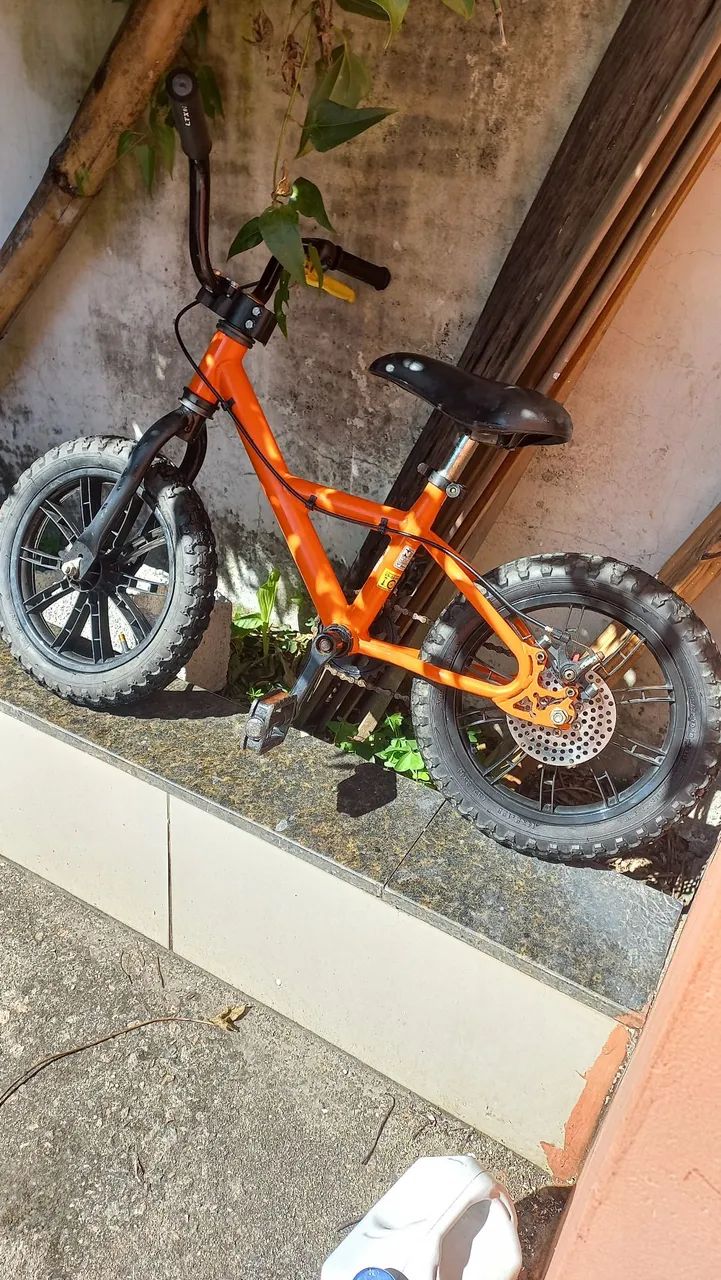 Bicicleta infantil BTWIN aro 14 com freio a disco  - Foto 2