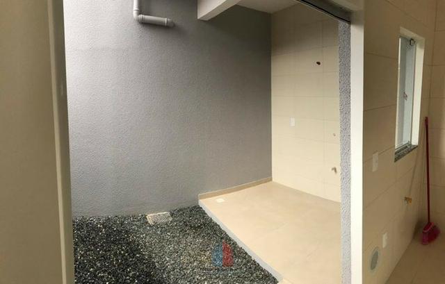 Sobrado Geminado em Rua Asfaltada no Bairro Itaum - Foto 9