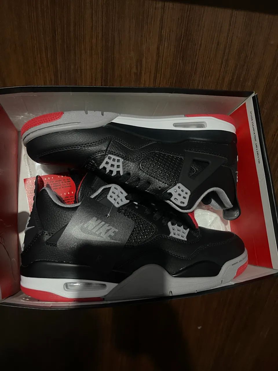 Tênis Jordan 4 bred 
