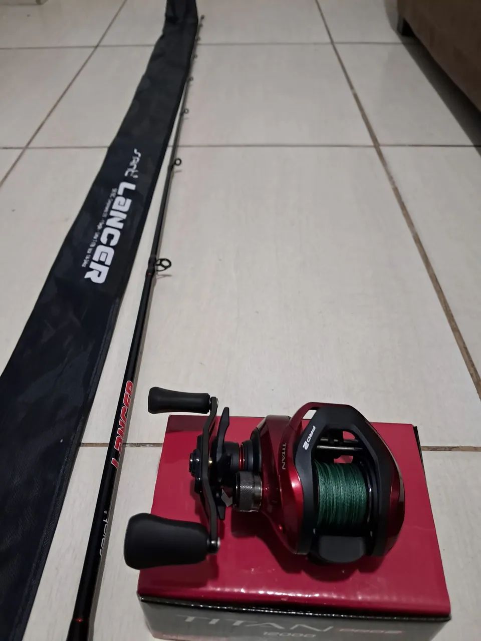 Vendo carretilha e vara, conjunto novo - Foto 5