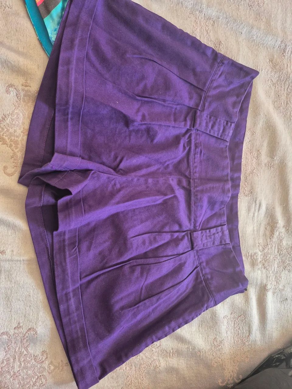 Shorts tam.P, cor uva. Lindíssimo,  35,00