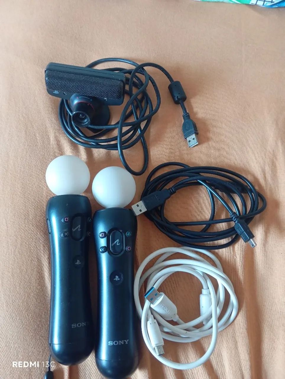 Vendo 2 ps move + câmera do ps3