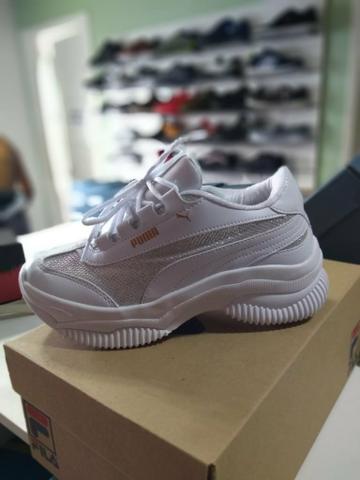 Adidas & Puma - Foto 2
