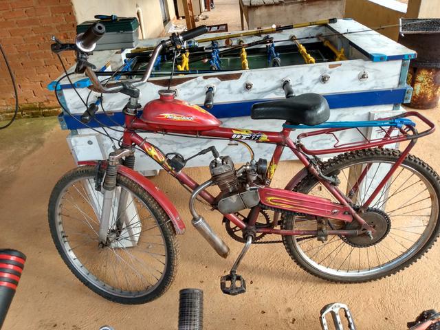 Bicicleta motorizada muito boa