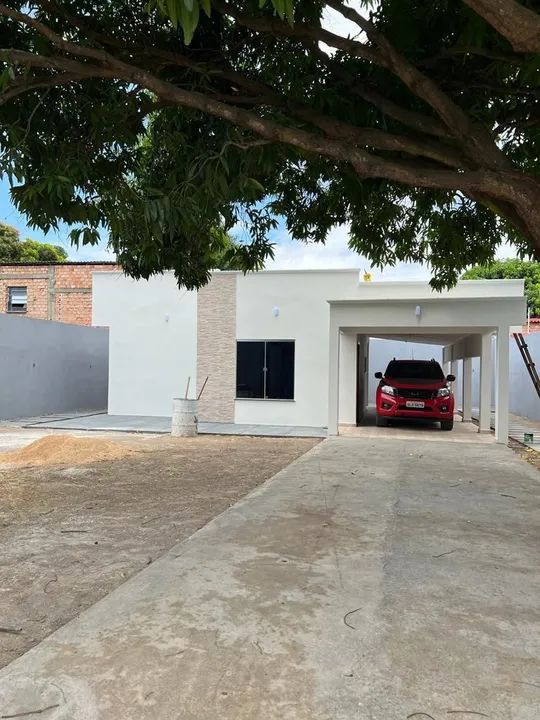 Casa com garagem coberta e quintal - Foto 4