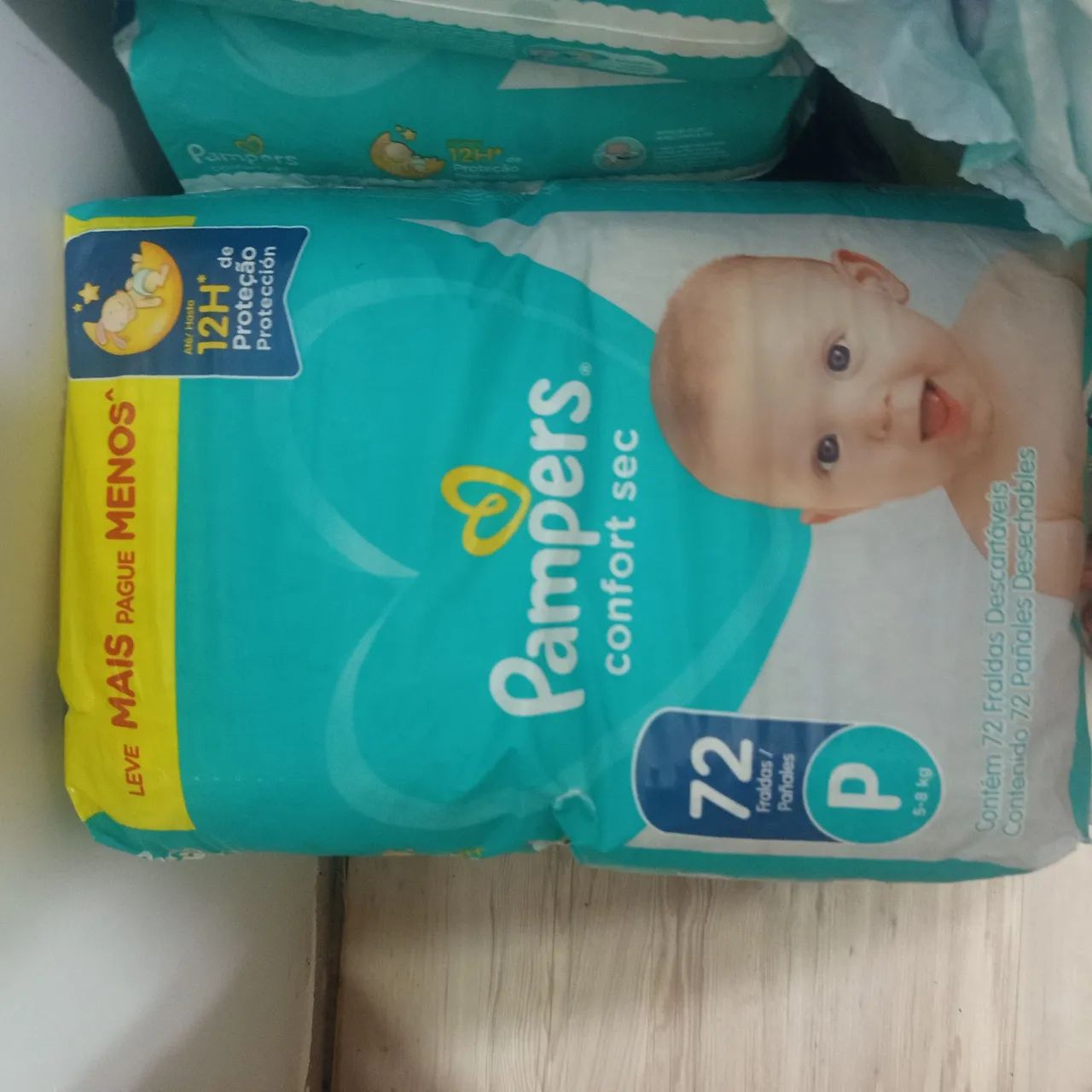 Fraldas Pampers com embalagem danificada  - Foto 5