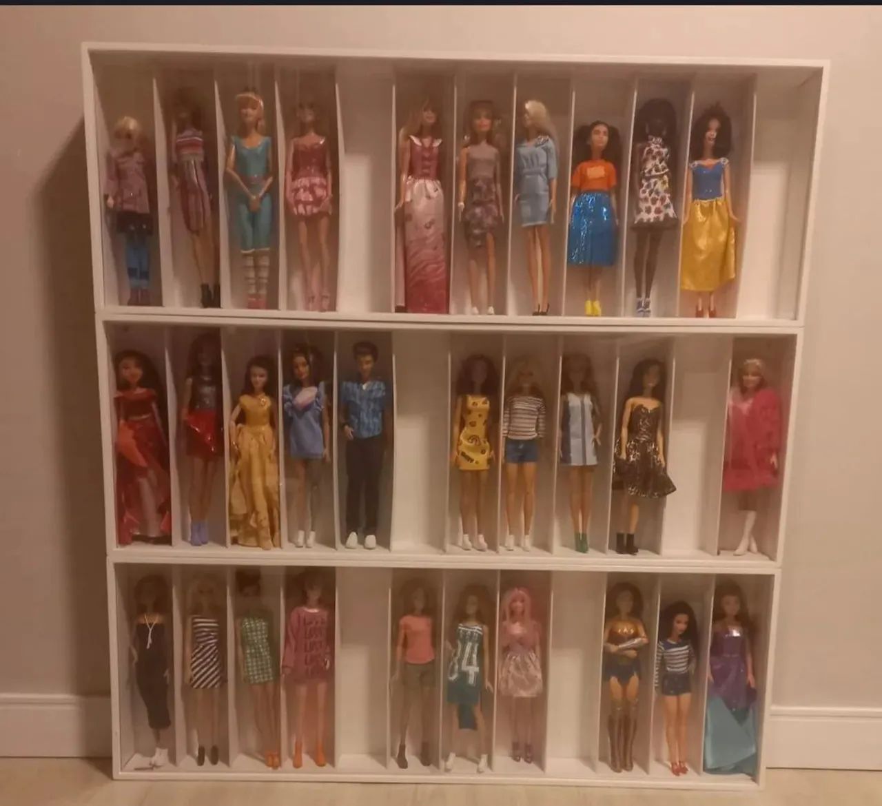 Expositor de bonecas