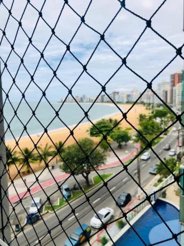 Apartamento com 2 dormitórios à venda, 65 m² por R$ 595.000 - Praia da Costa - Vila Velha/
