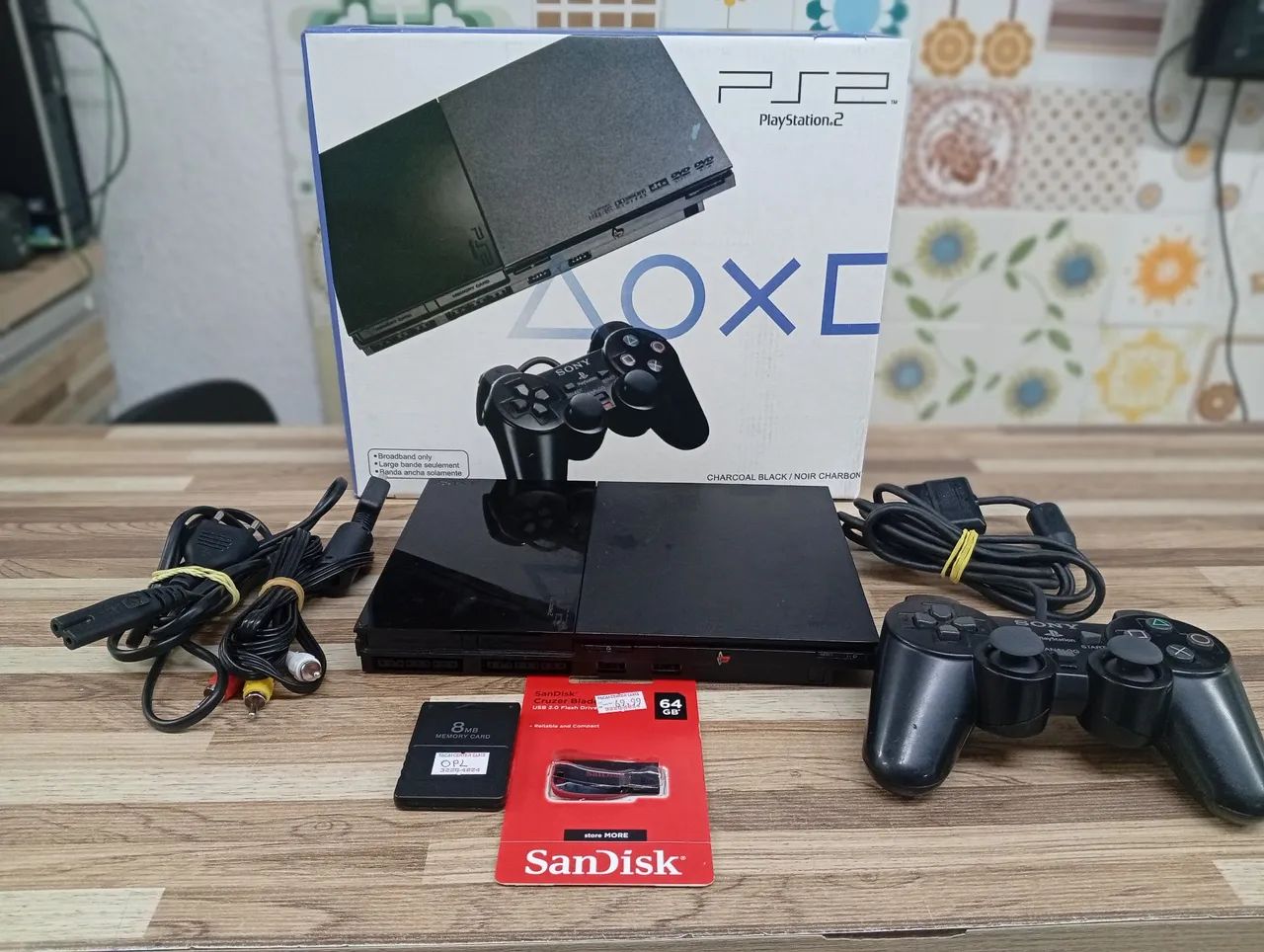 Playstation 2 + Pen drive 64gb + 24 jogos e 6mil jogos emulador + Memory Card+ 2 controles