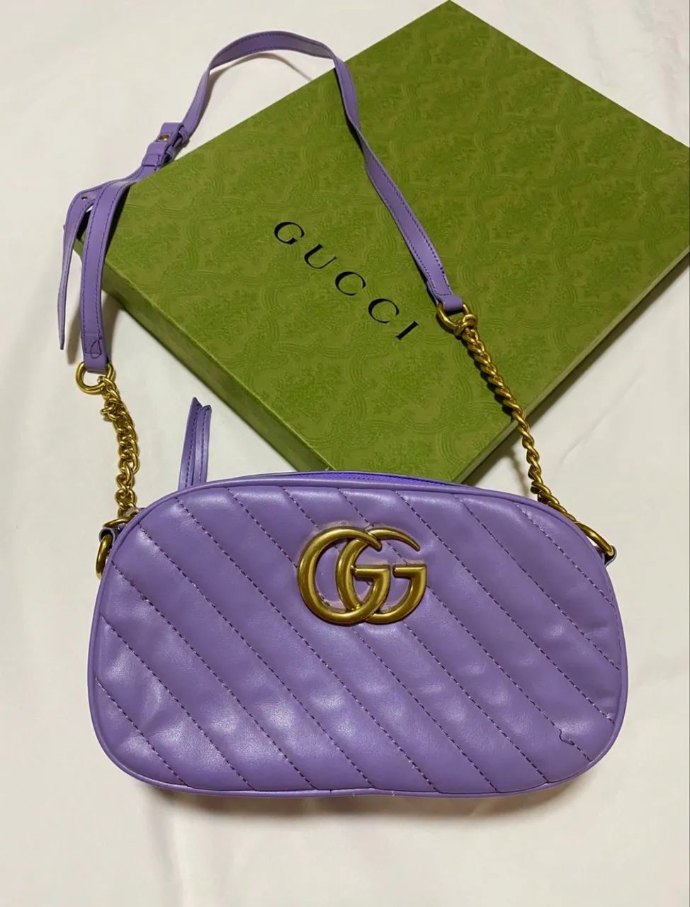 Bolsa lilás Gucci 