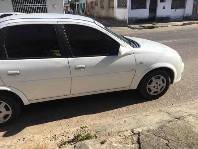 Corsa sedan 2012 - Foto 3