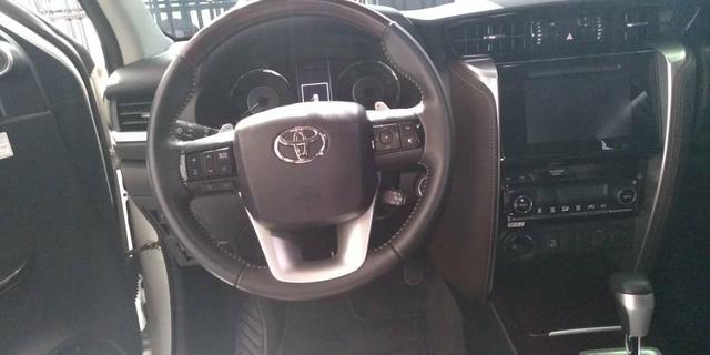 Vendo uma linda nova toyota sw4 srx diesel 4x4 7l top 5km 2018/2018 - Foto 8
