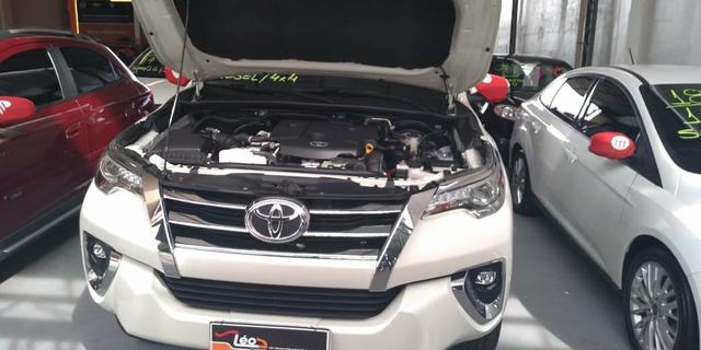 Vendo uma linda nova toyota sw4 srx diesel 4x4 7l top 5km 2018/2018 - Foto 6