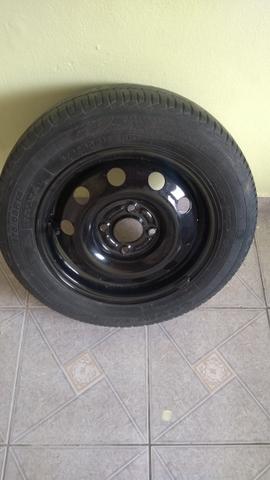 100$ roda linha Ford pneu 175/65/14 meia vida - Foto 3