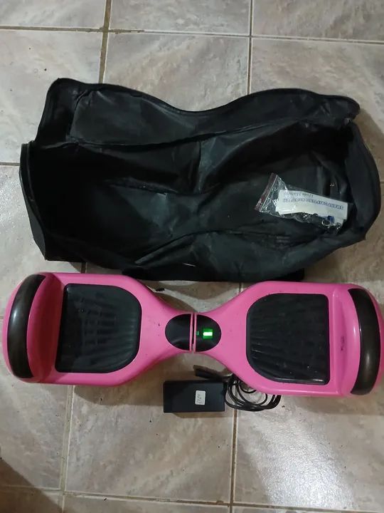 Hoverboard rosa com seu carregador e uma bolsa de transporte R$ 450,00