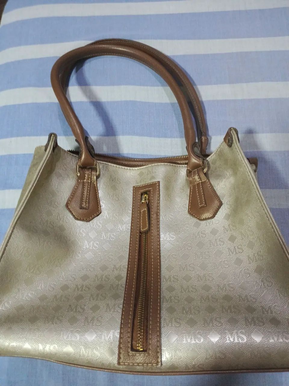 Bolsa Mônica Sanshes.