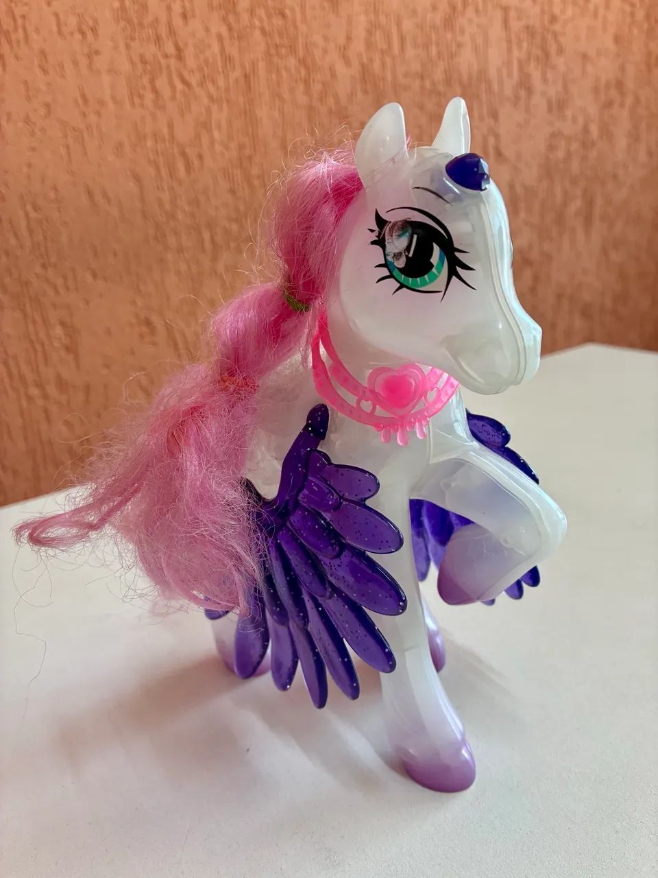 pônei de brinquedo com luz e som