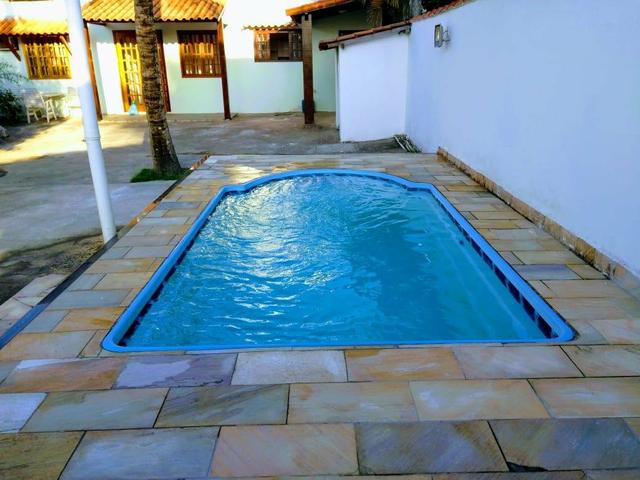 Casa com quintal, espaço gourmet com churrasqueira, piscina, espaço fitness, laguinho, etc - Foto 4
