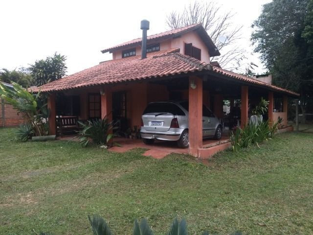 Velleda oferece sitio com ótima casa, cond fechado, pertinho da RS040