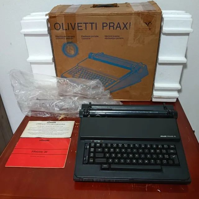 máquina de escrever olivetti praxis 20 na caixa