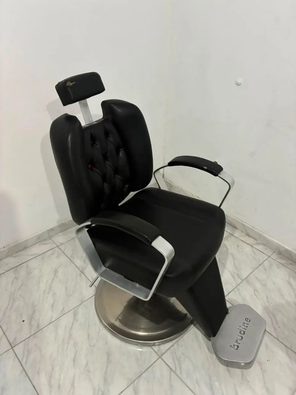 Cadeira de barbeiro top.