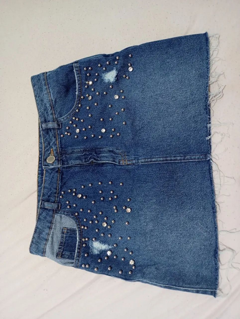 Mini saia jeans Renner com brilho Tam.36