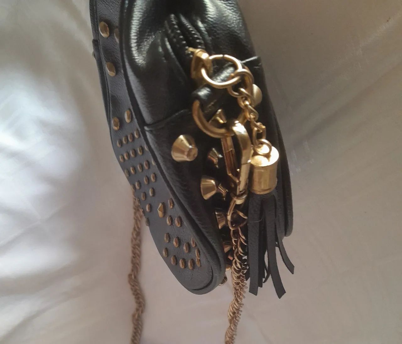 Bolsa  Onça com  Ribites Dourada  - Foto 3