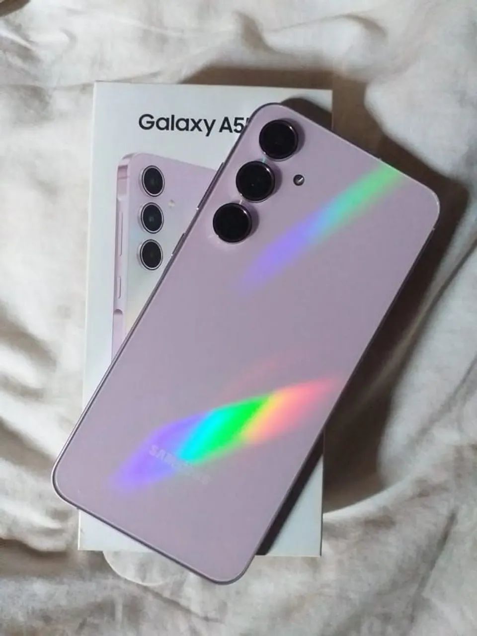Vendo um celular Samsung Galaxy A55 5g na cor rosa