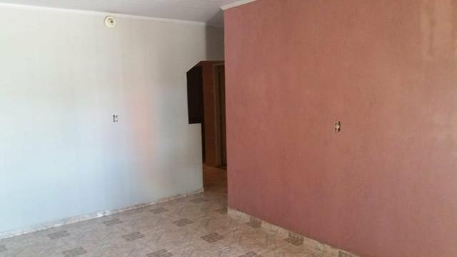 Casa com barraco de fundos