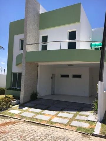 Vende casa em condomínio três suítes + escritório e dependência CA 0477