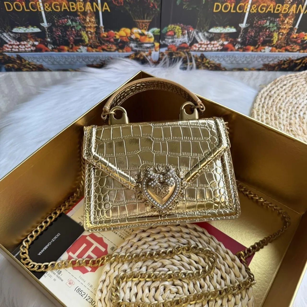 Bolsa Dourada em couro Dolce Gabbana