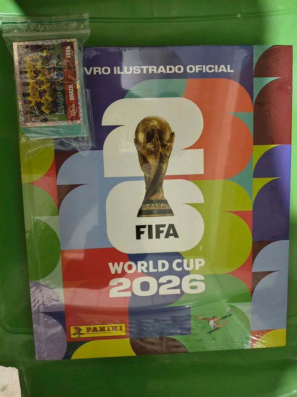 Álbum capa dura grátis copa 2026 e 100 figurinhas 