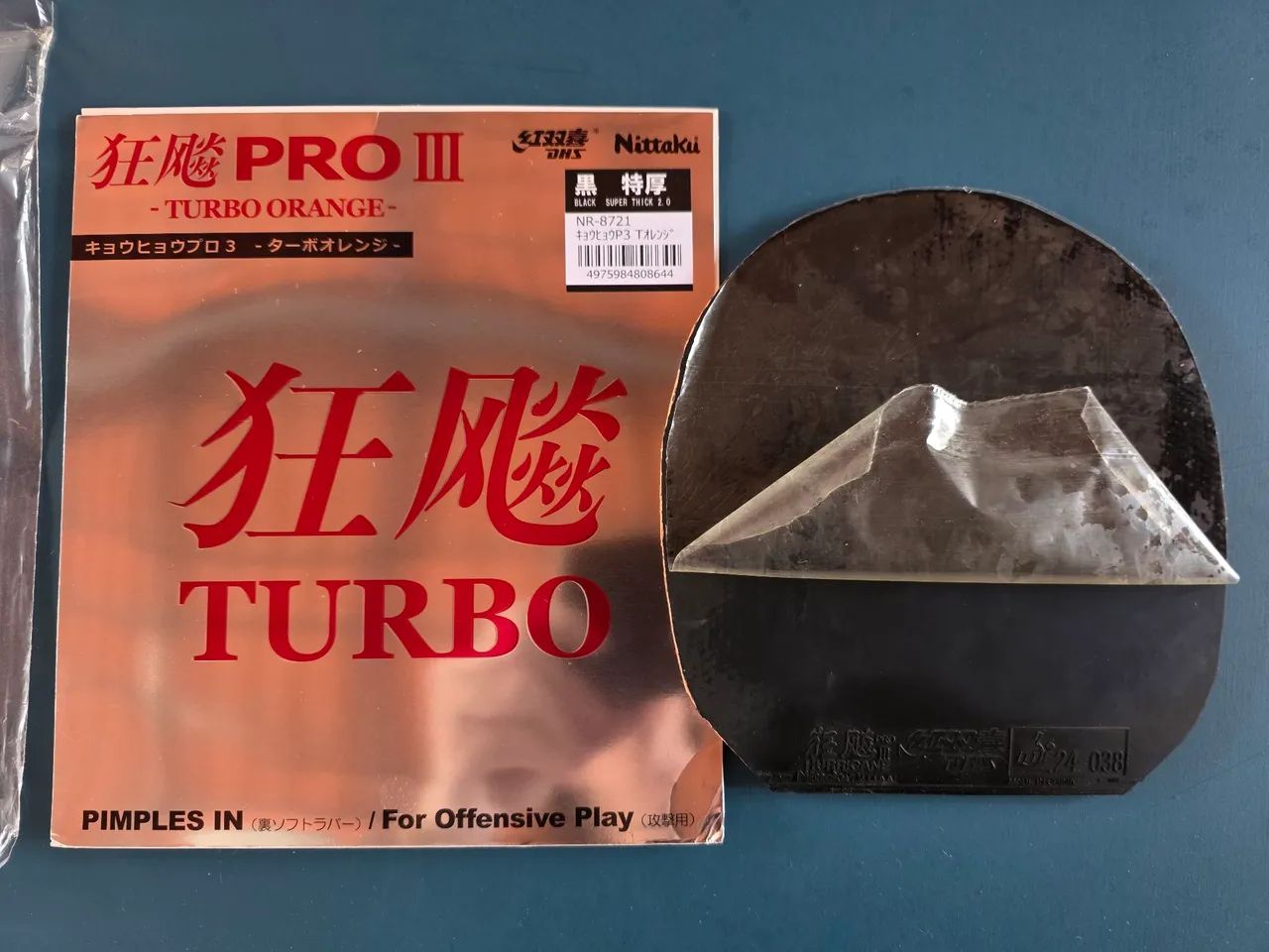 Borracha de tênis de mesa Nittaku Hurricane Pro III Turbo Orange (2.0 preta)