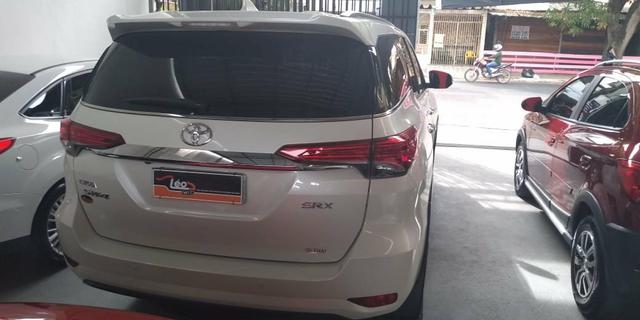Vendo uma linda nova toyota sw4 srx diesel 4x4 7l top 5km 2018/2018 - Foto 4