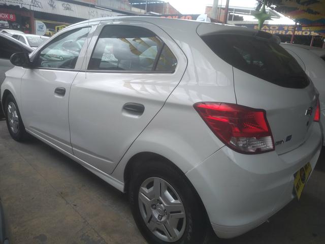 Onix lt 1.4 completao com gnv único dono - Foto 2