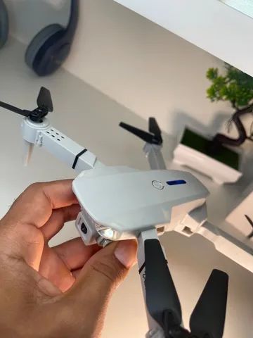 Drone tira foto e filma com carregador de bateria USB garantia hélice extra  - Foto 4