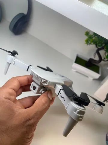 Drone tira foto e filma com carregador de bateria USB garantia hélice extra  - Foto 3